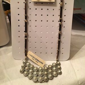 Reduced price-
Necklace and pierced earrings